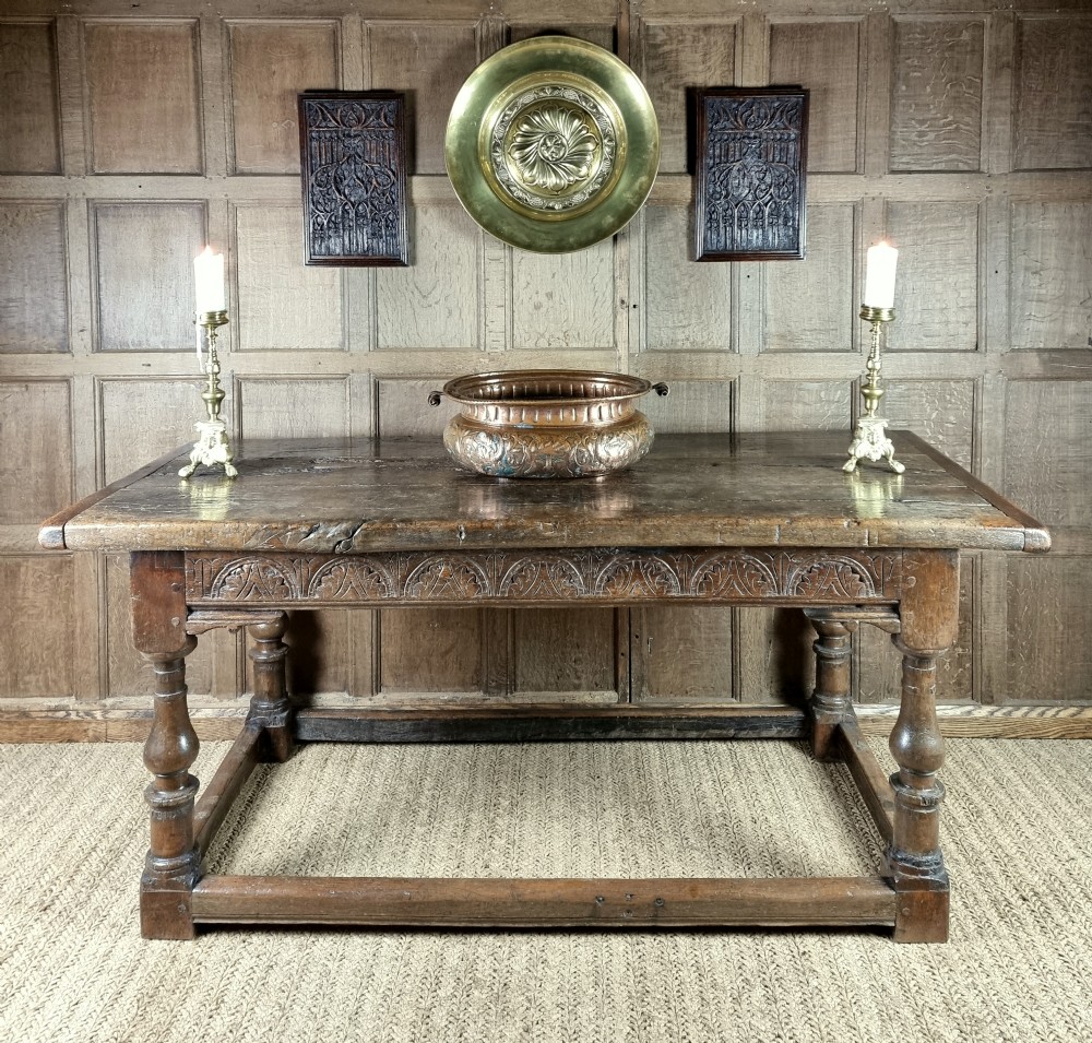 A 17th century oak refectory table.