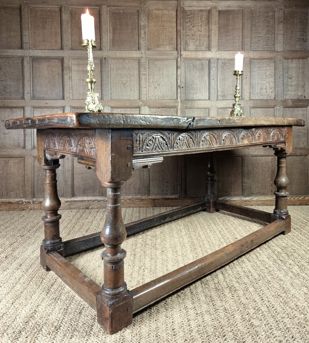 A 17th century oak refectory table. View XXXI