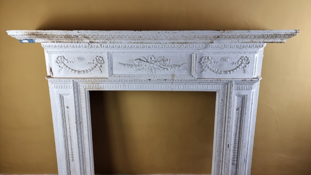 A large 19th century cast iron fire surround. View V