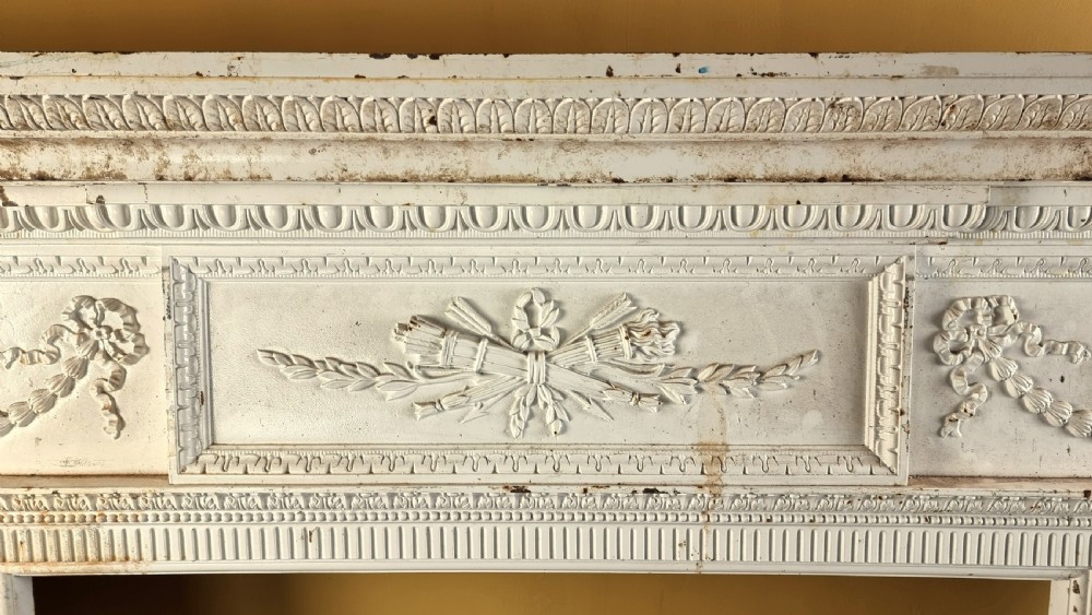 A large 19th century cast iron fire surround. View VI