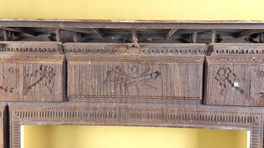 A large 19th century cast iron fire surround. View XVI