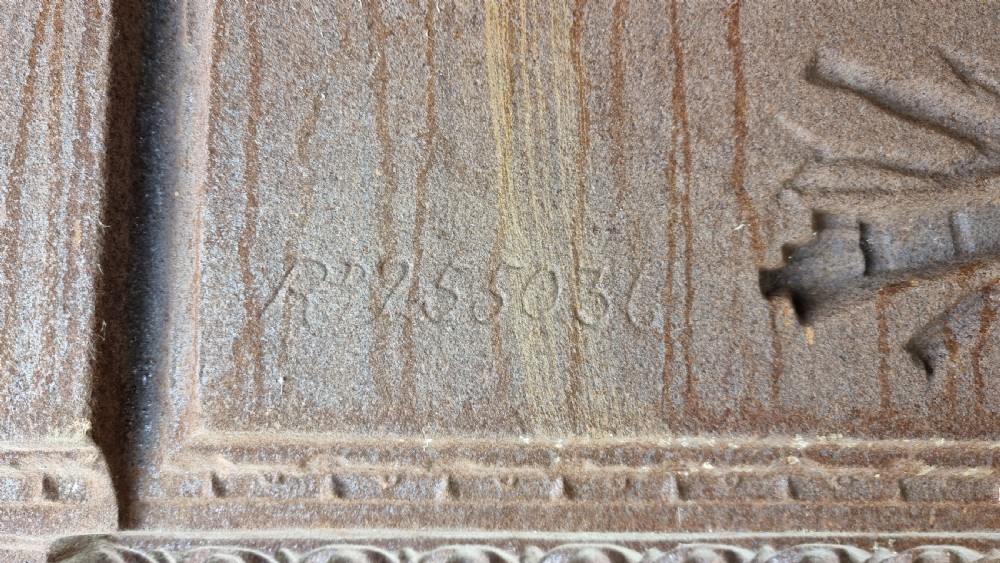 A large 19th century cast iron fire surround. View XXI