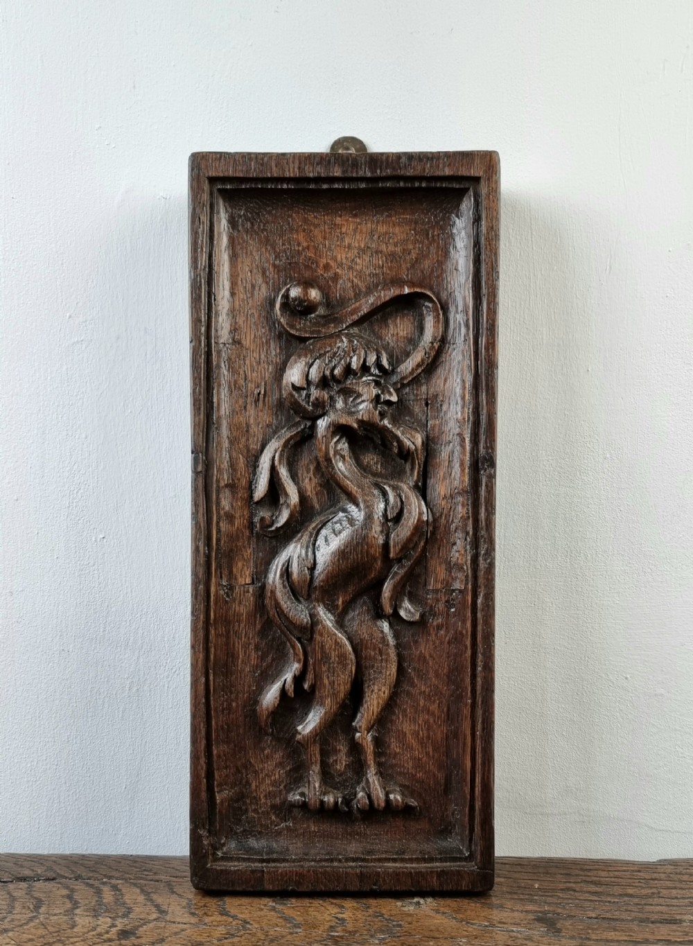 A small 17th century carved oak panel.