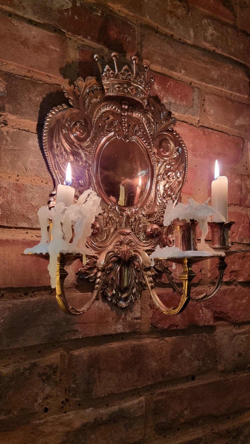 A pair of 19th century repousse wall sconces.  View III