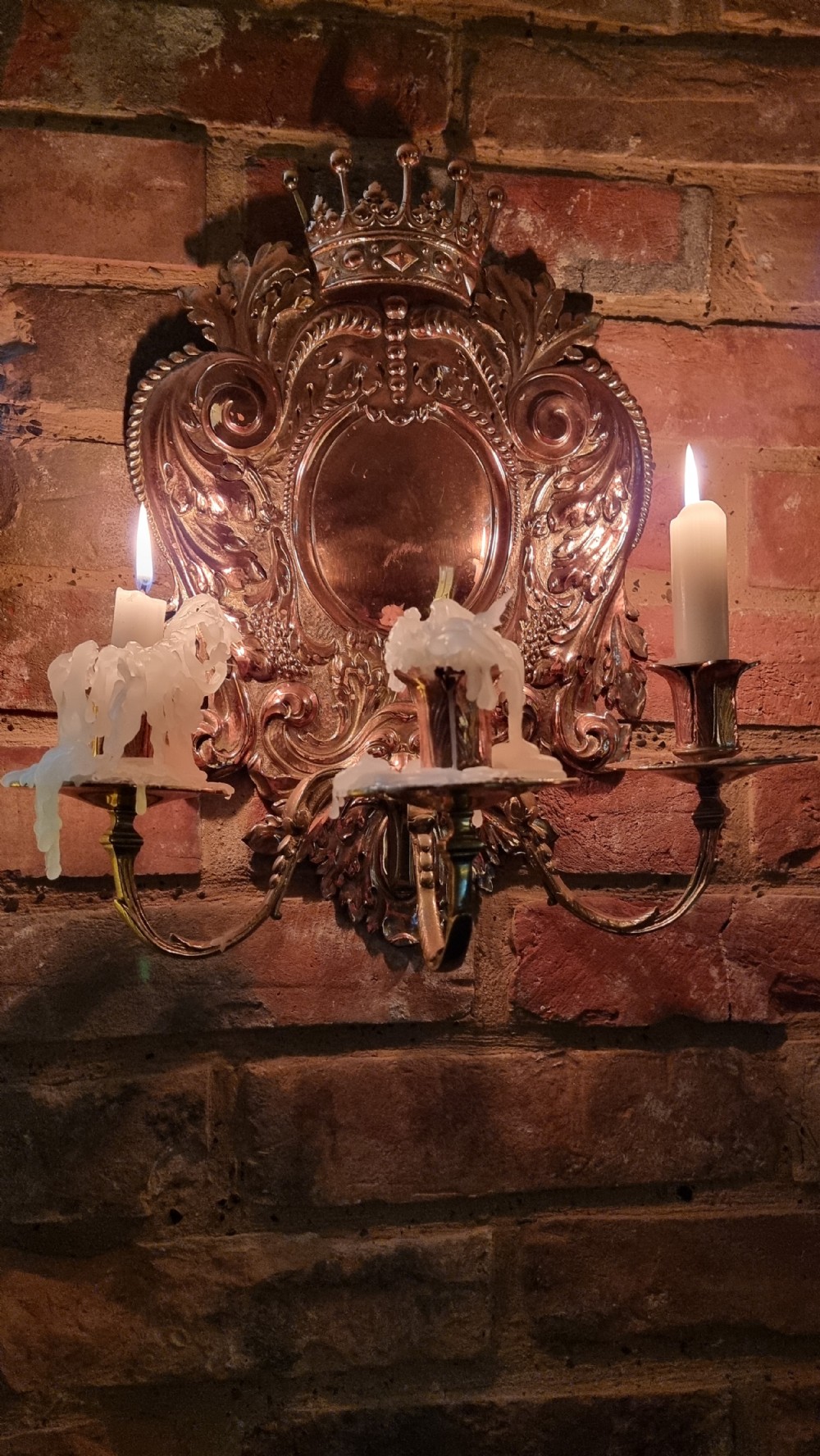 A pair of 19th century repousse wall sconces.  View IV