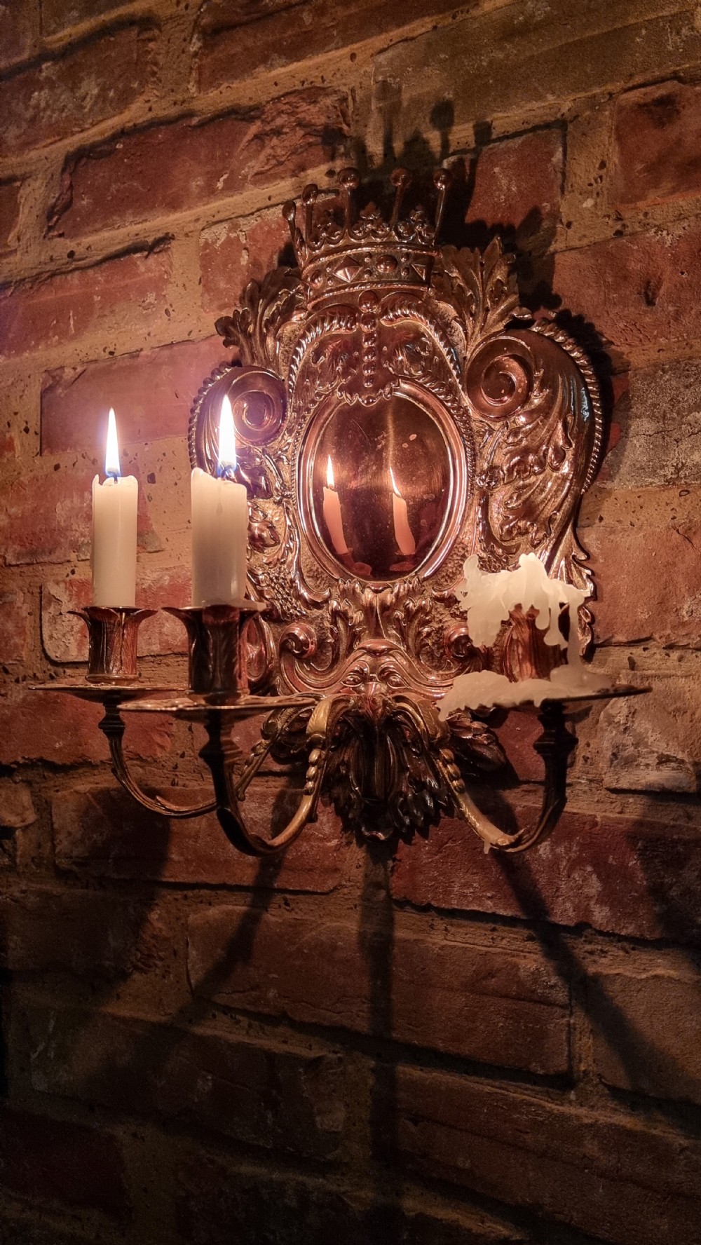 A pair of 19th century repousse wall sconces.  View V