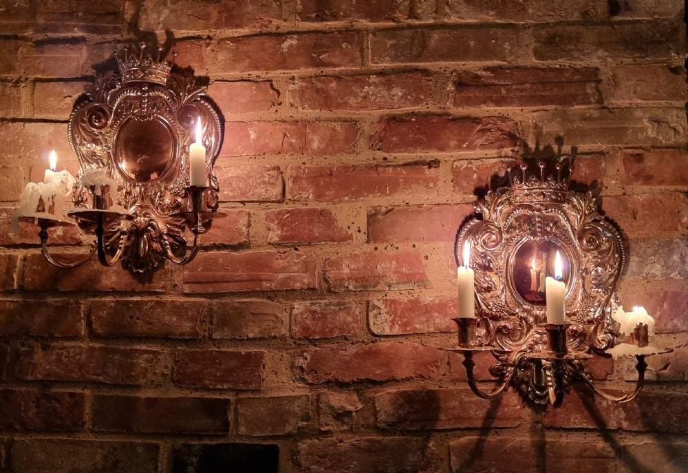 A pair of 19th century repousse wall sconces.  View VIII