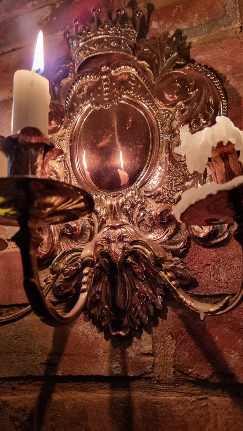 A pair of 19th century repousse wall sconces.  View IX