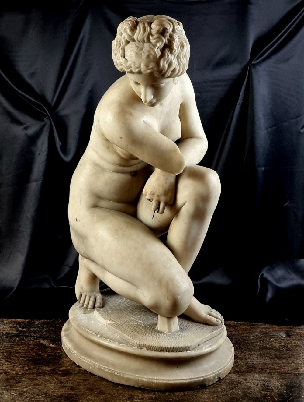 A large alabaster statue.