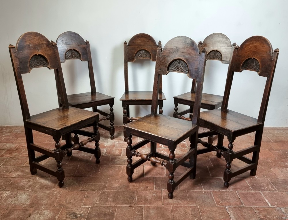 A set of six late 17th century dining chairs.