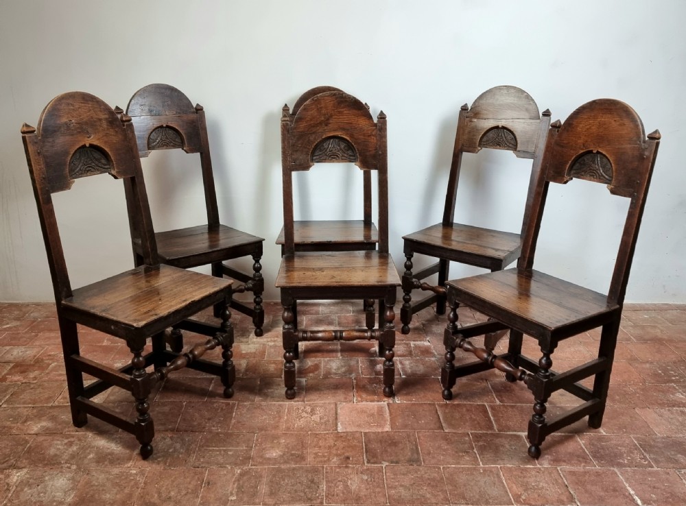 A set of six late 17th century dining chairs. View II