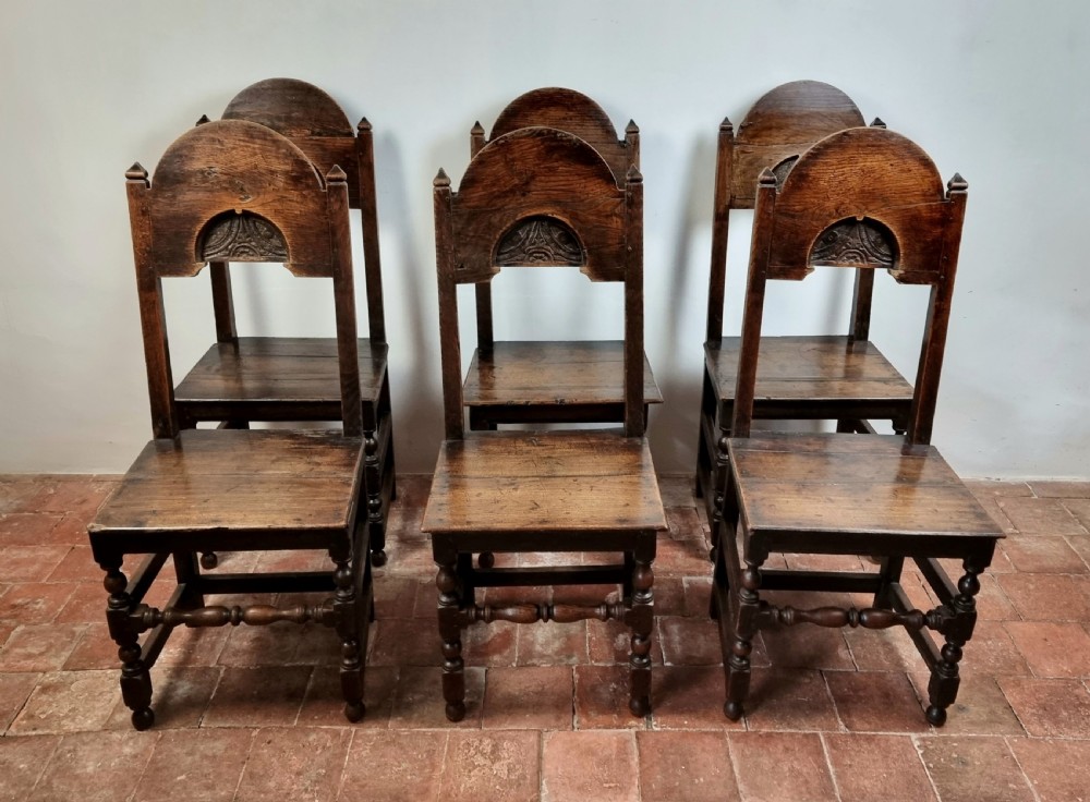 A set of six late 17th century dining chairs. View III