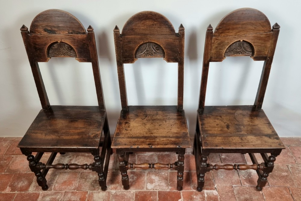 A set of six late 17th century dining chairs. View IV