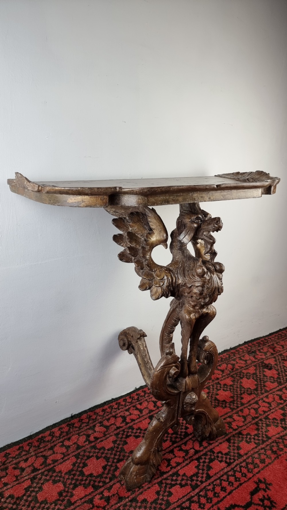 A 19th century gilt carved console table.  View VII