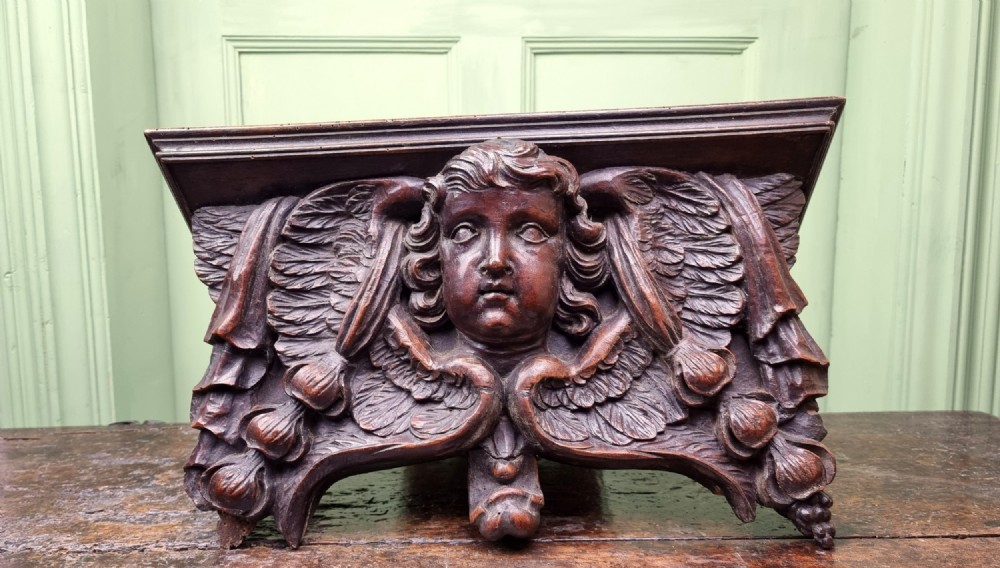 A Late 17th Century Cherub Wall Bracket.