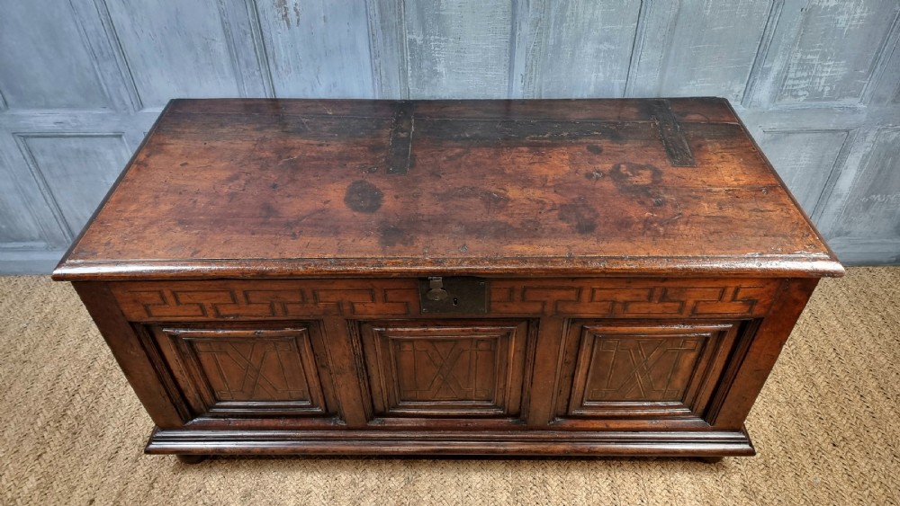 A late 17th century walnut coffer. View VI