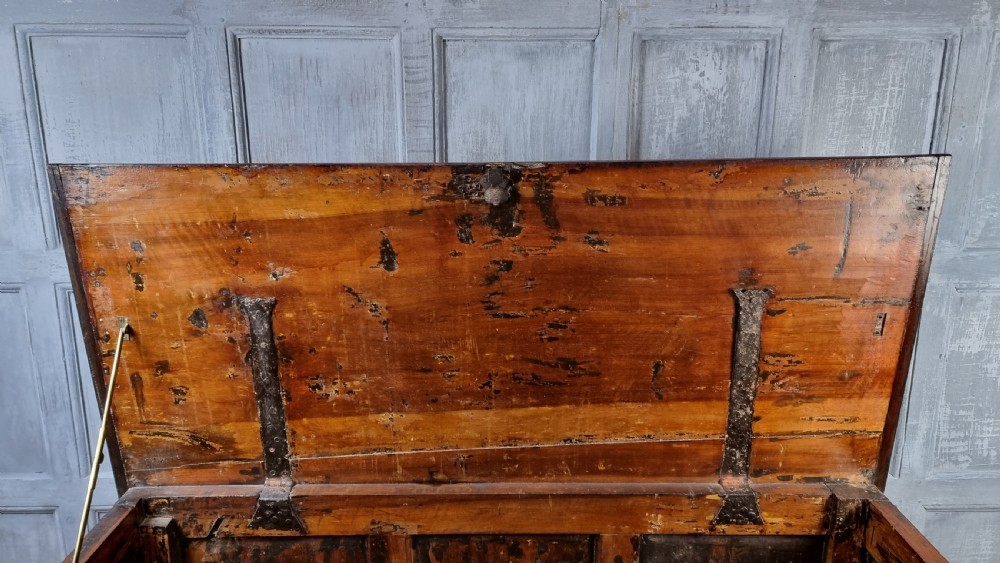 A late 17th century walnut coffer. View IX