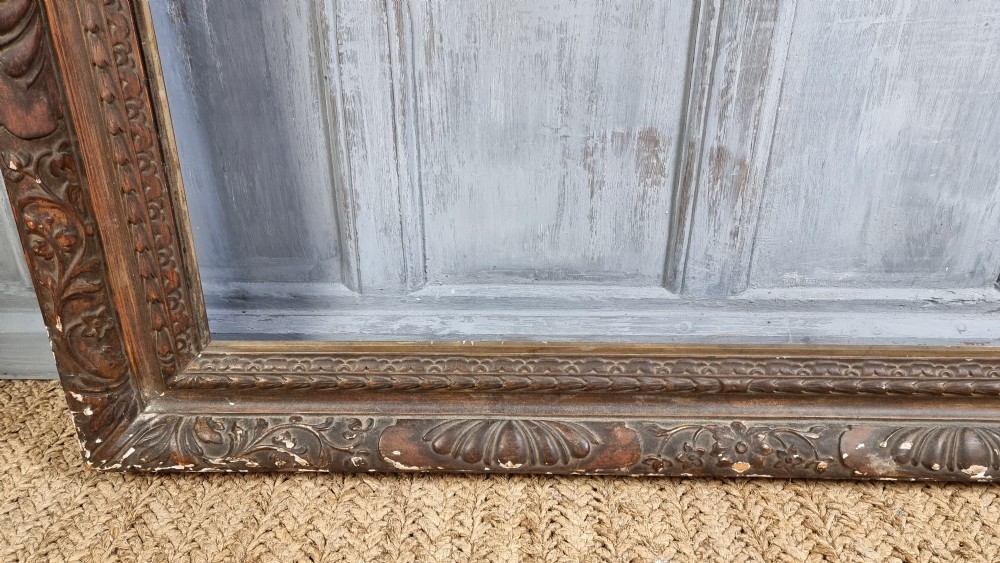 A large 17thC style carved picture frame. View V