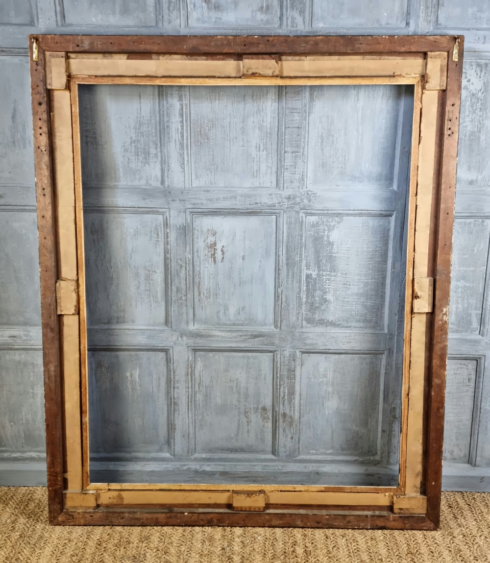 A large 17thC style carved picture frame. View VIII
