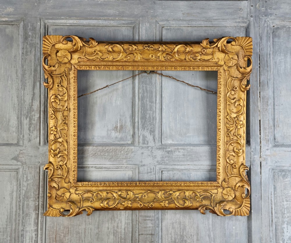 A small 18th century gilt carved picture frame. 