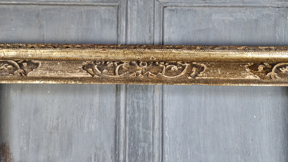 A 17th century gilt carved picture frame.  View III
