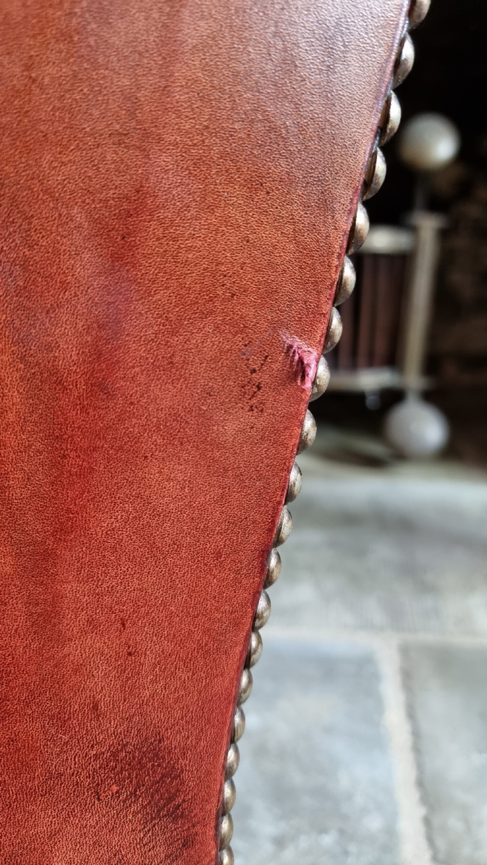 A small Georgian style leather wingchair.  View V