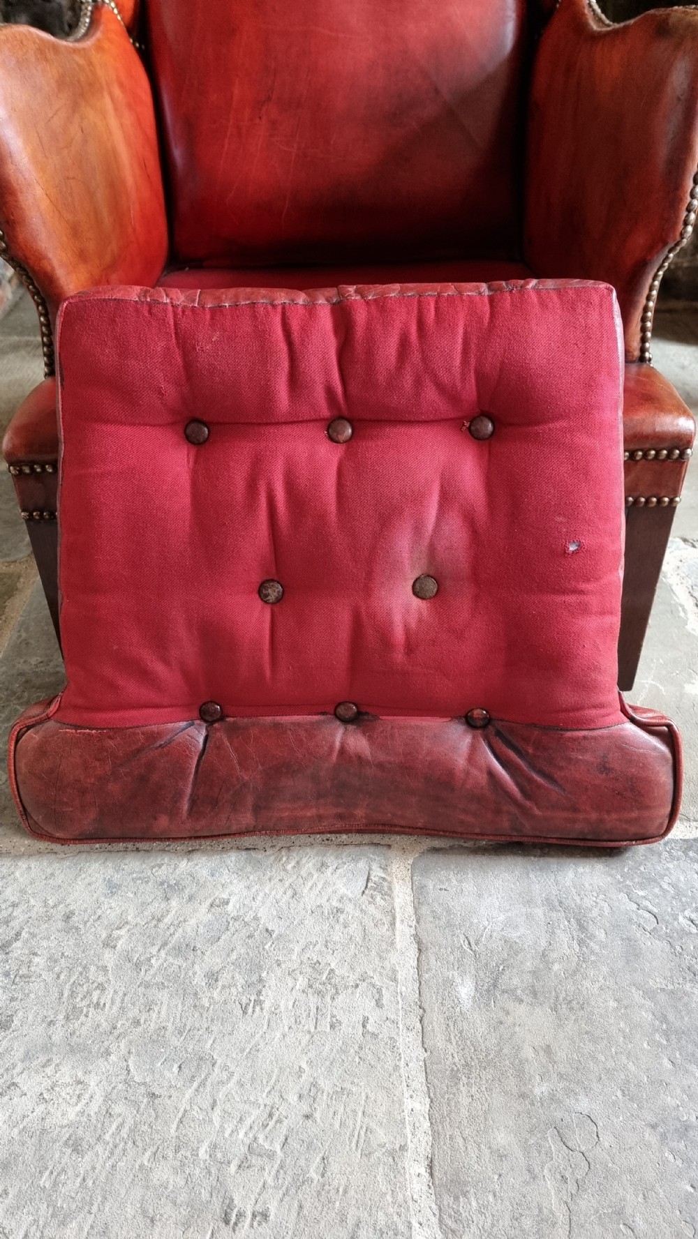 A small Georgian style leather wingchair.  View XI