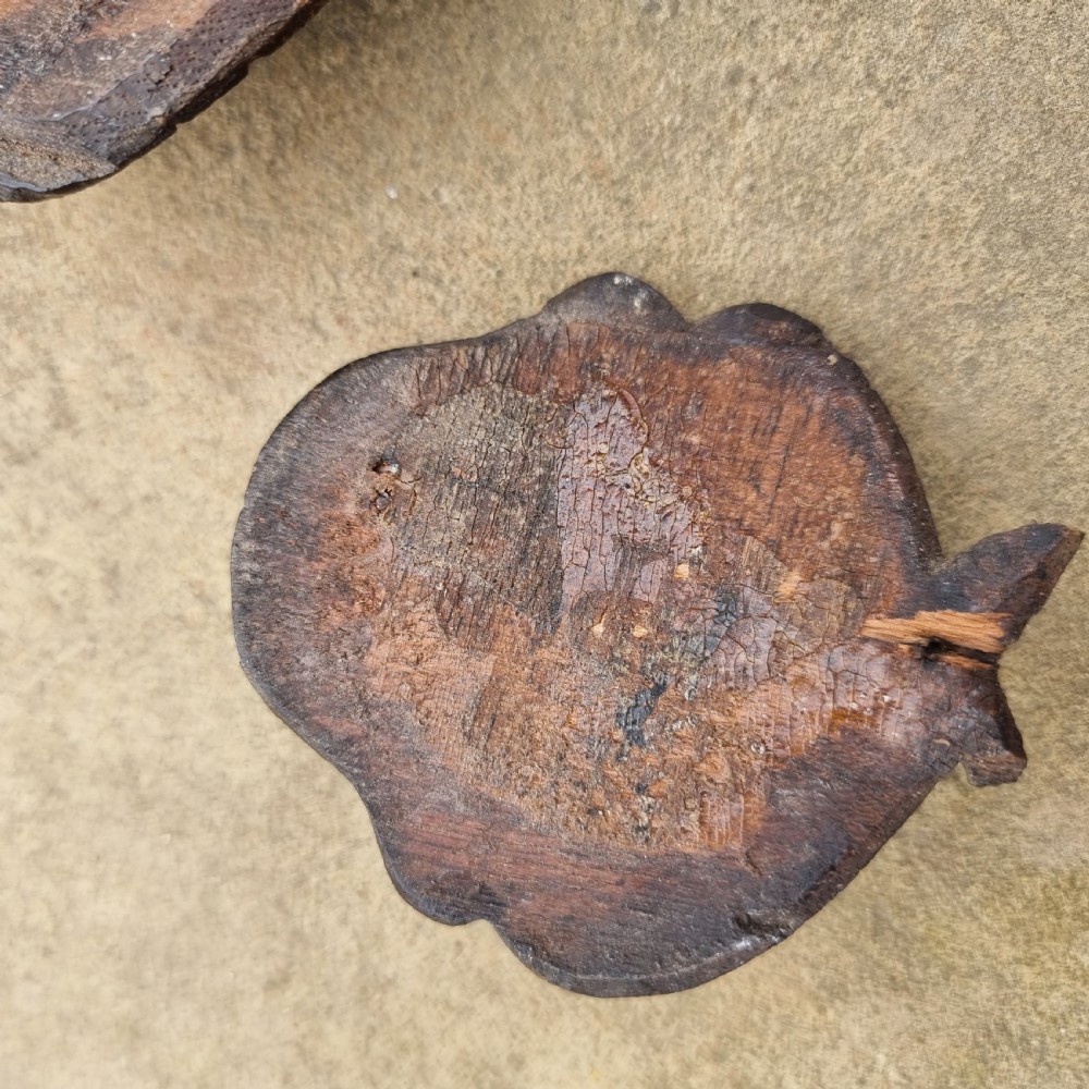 Three 17th century winged heads. View VII