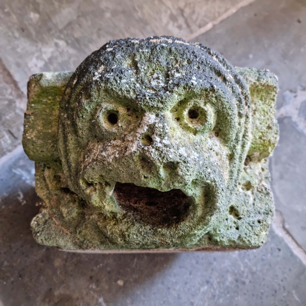 A 15th century limestone gargoyle. View II