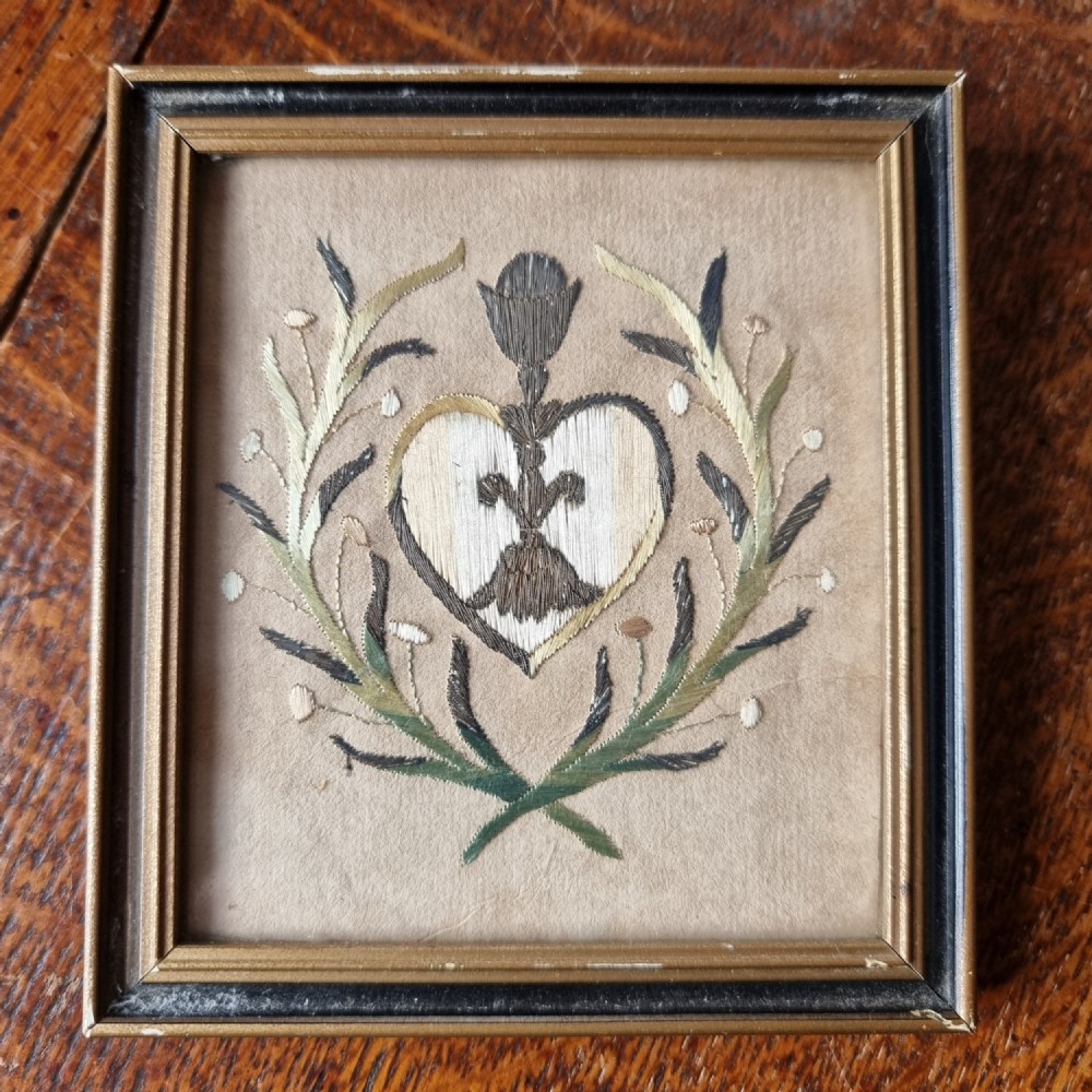 A small 18th century silk picture. 