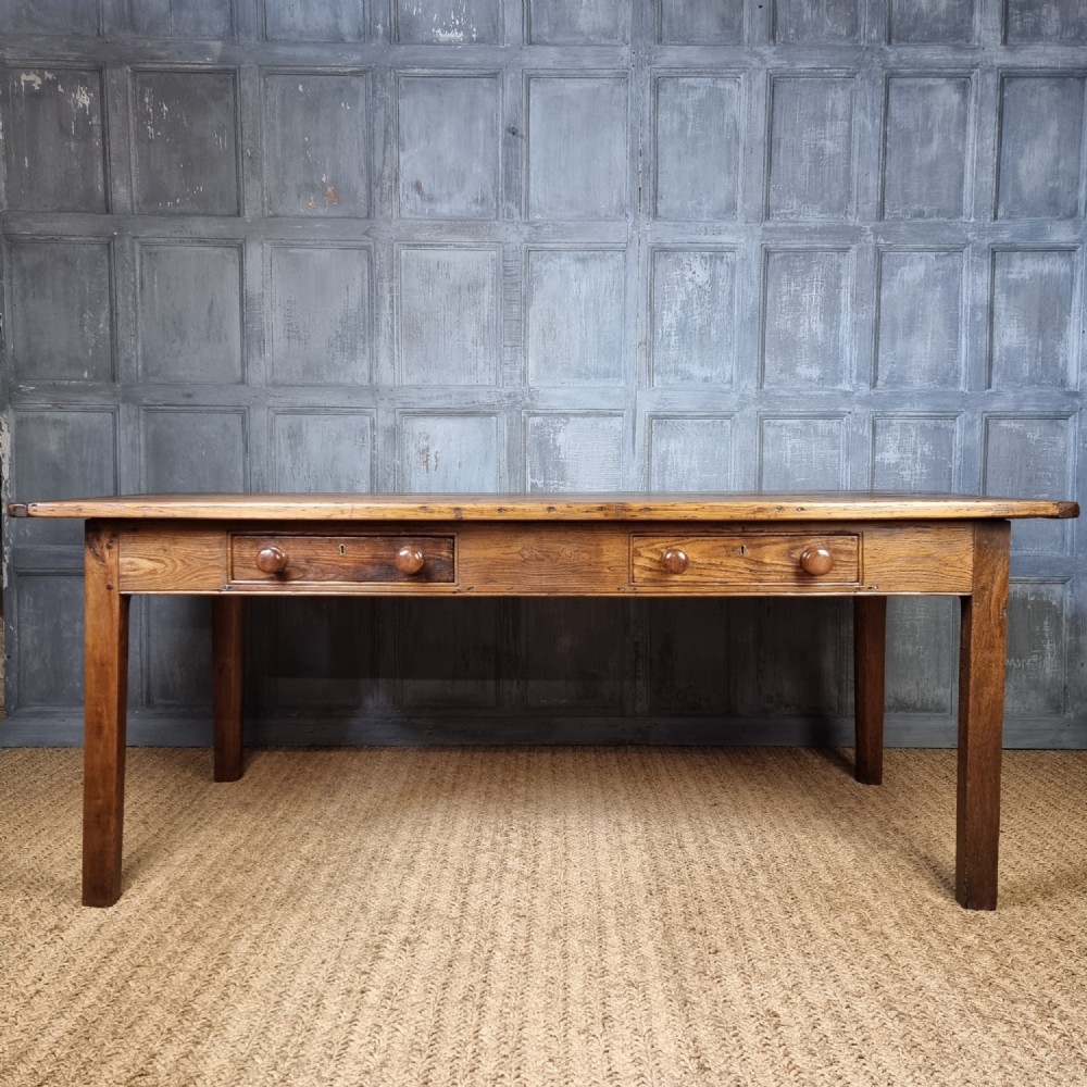 An early 19th century farmhouse table. 