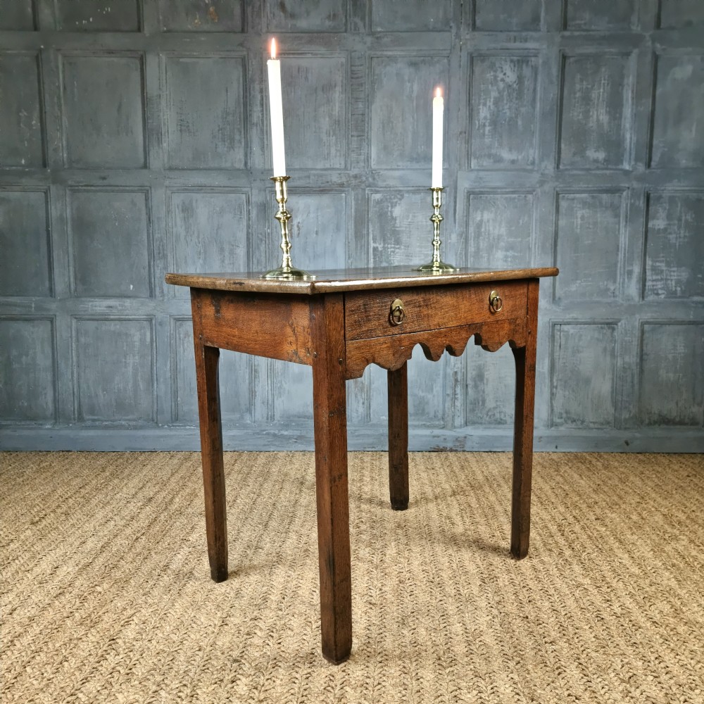An 18th century oak side table. View III