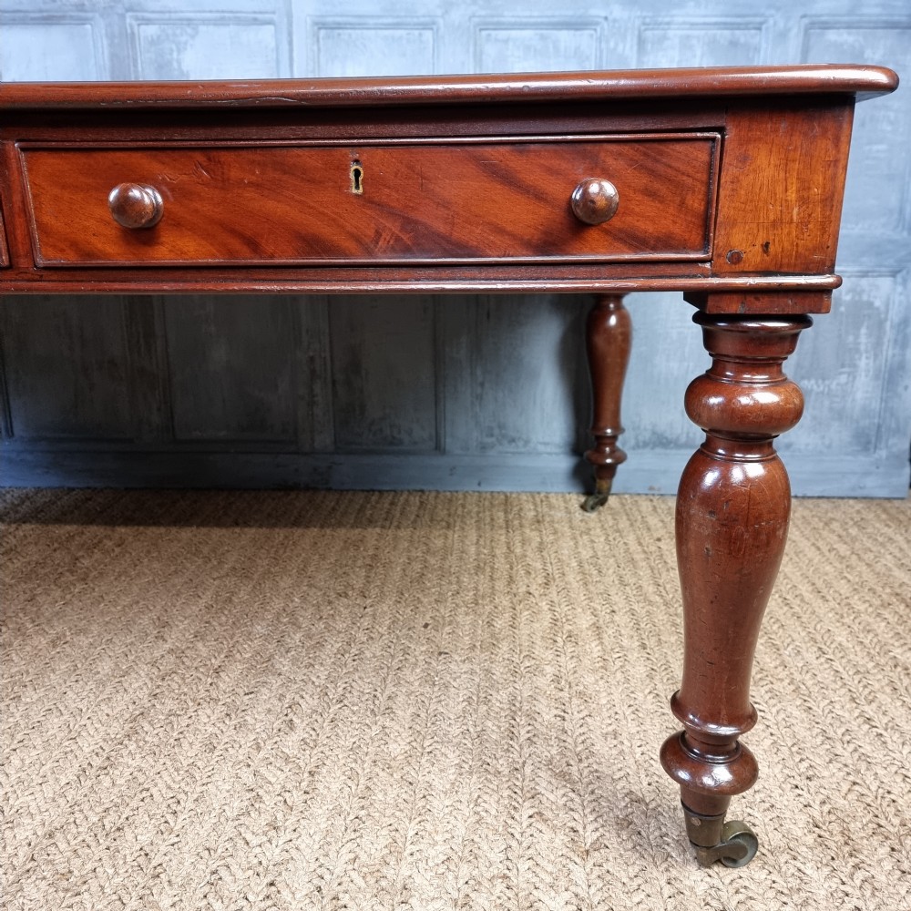 A large victorian partners desk.  View III