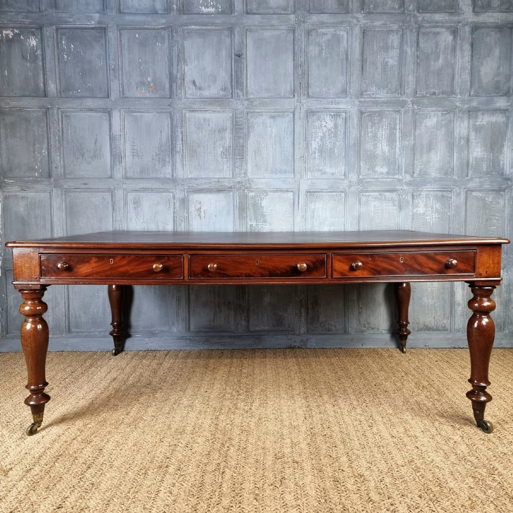 A large victorian partners desk.  View X