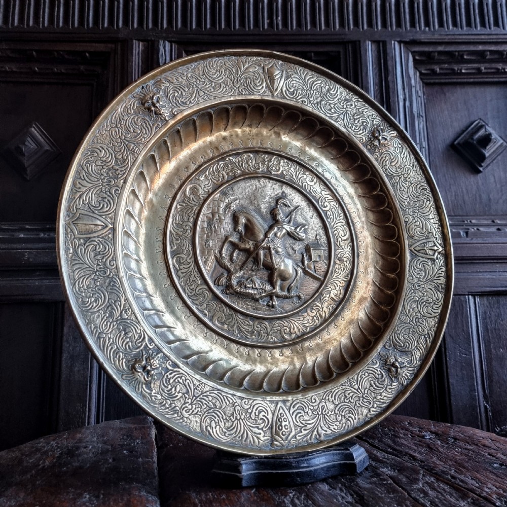 A 17th century alms dish. 