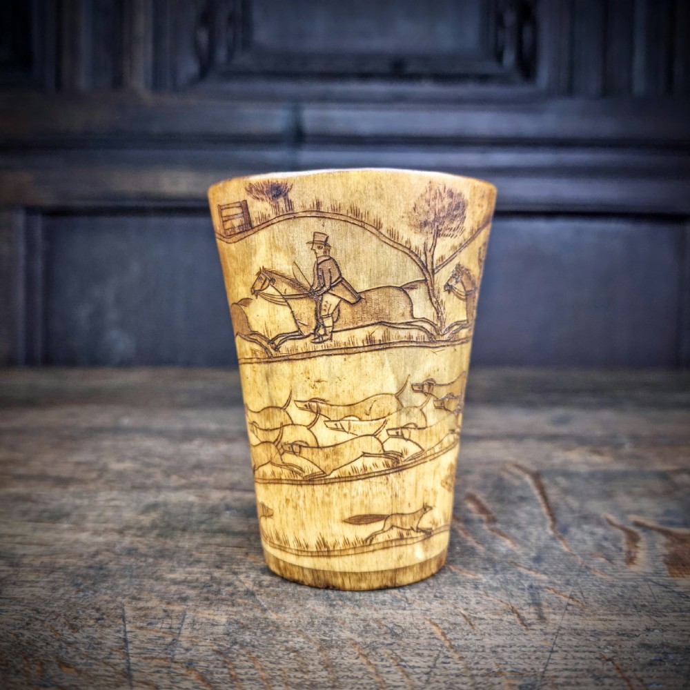 A george III horn hunting cup.