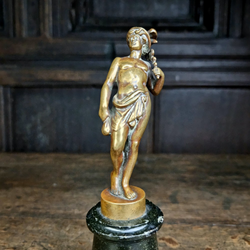 A small 19th century bronze mercury.  View VI