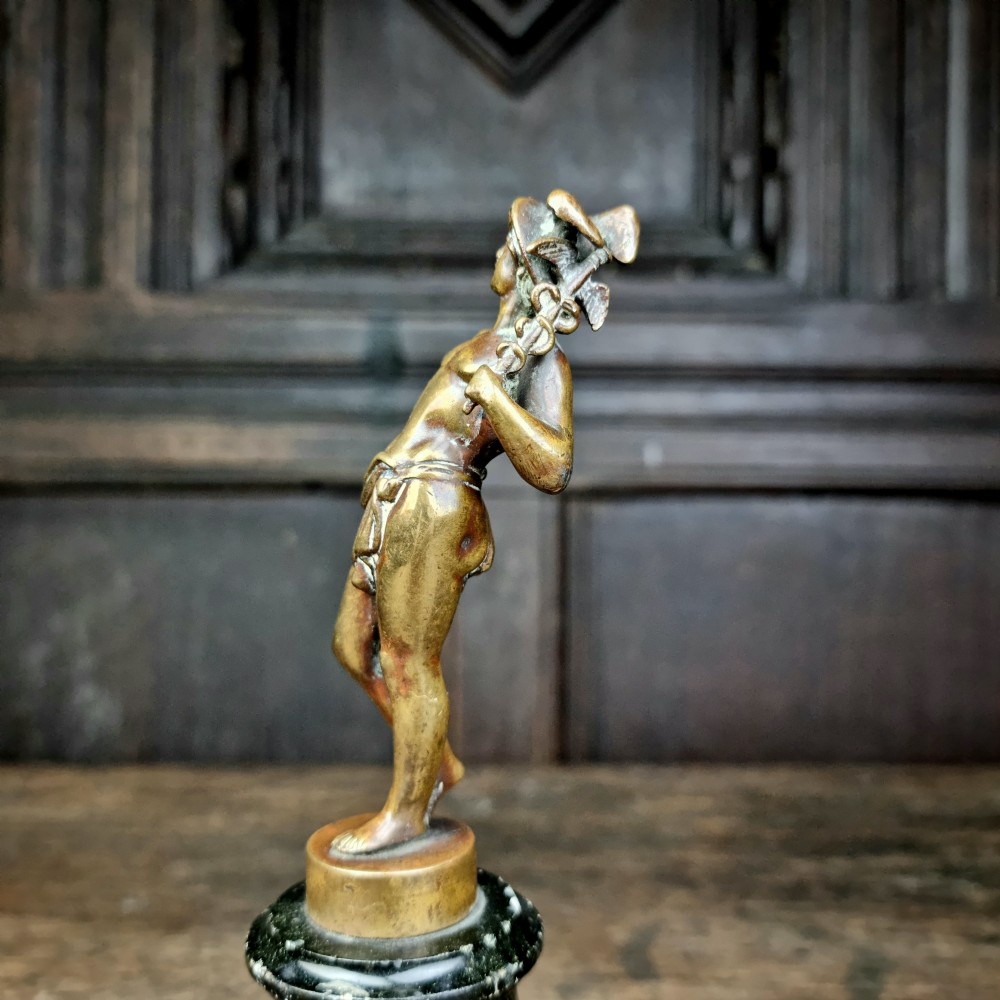 A small 19th century bronze mercury.  View XII