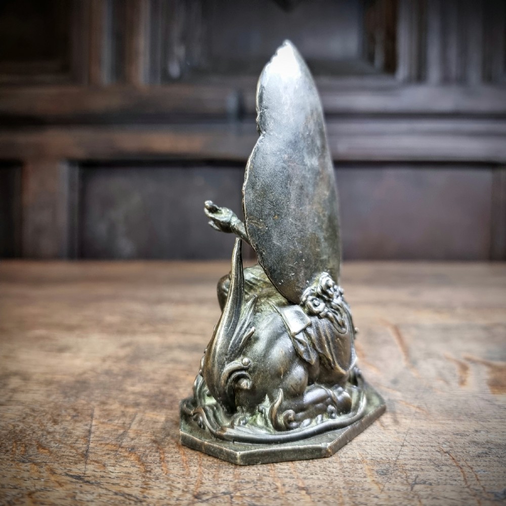 A small 19th century bronze figure of Guanyin. View V