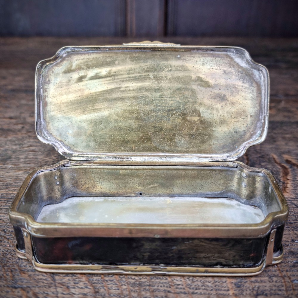 An 18th century sailors tobacco box.  View XI