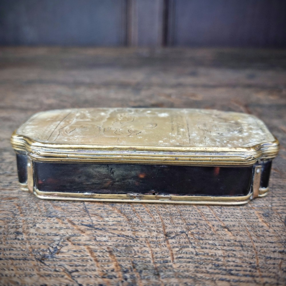An 18th century sailors tobacco box.  View XII