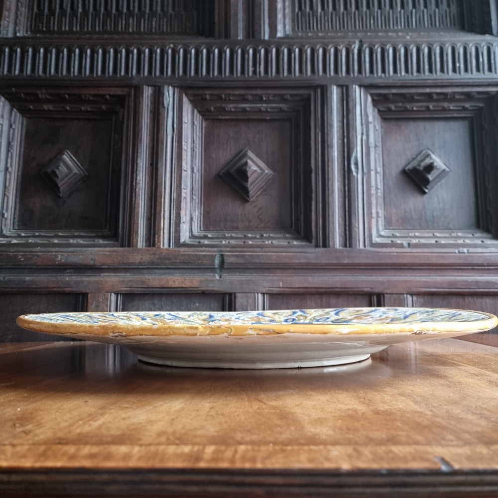 A massive 18th - 19th century majolica charger.  View XVI