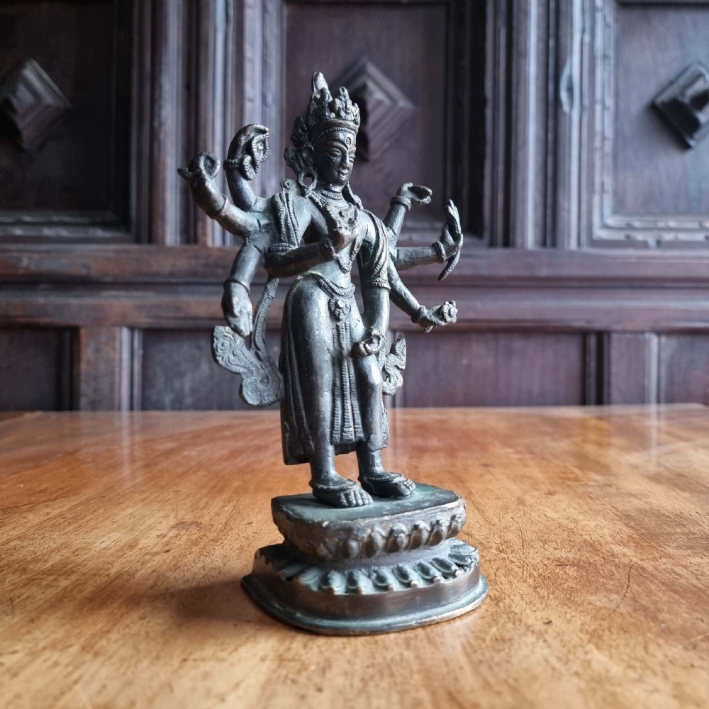 A late 19th century bronze figure of Vishnu.
