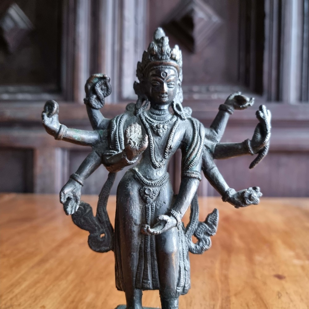 A late 19th century bronze figure of Vishnu. View V