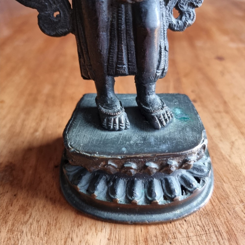A late 19th century bronze figure of Vishnu. View VI