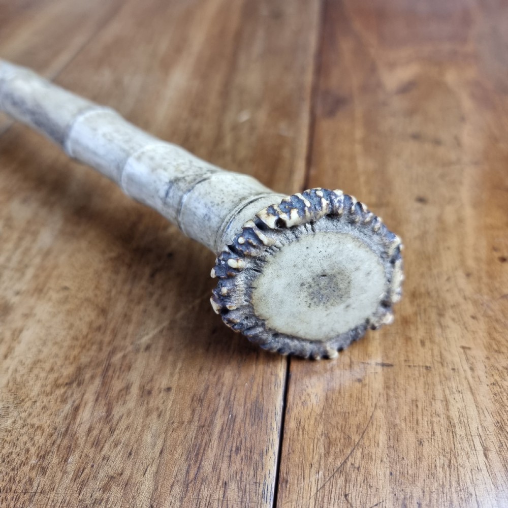 A 19th century bone walking cane. View III