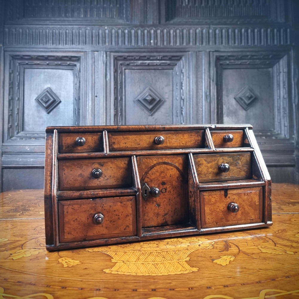 An early 18th century burr walnut jewelery chest. View II