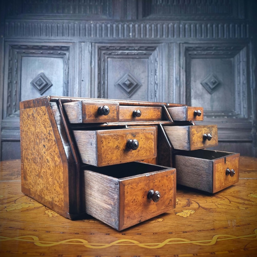 An early 18th century burr walnut jewelery chest. View IV