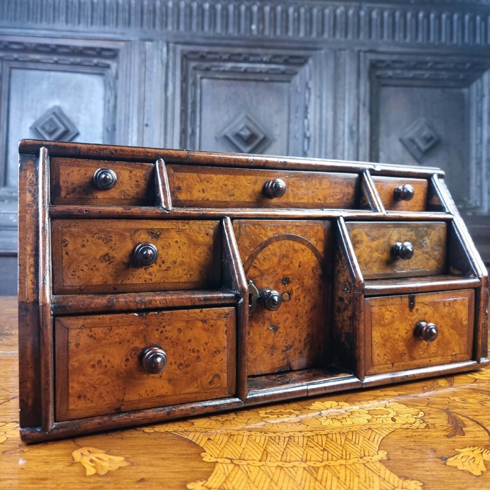An early 18th century burr walnut jewelery chest. View V