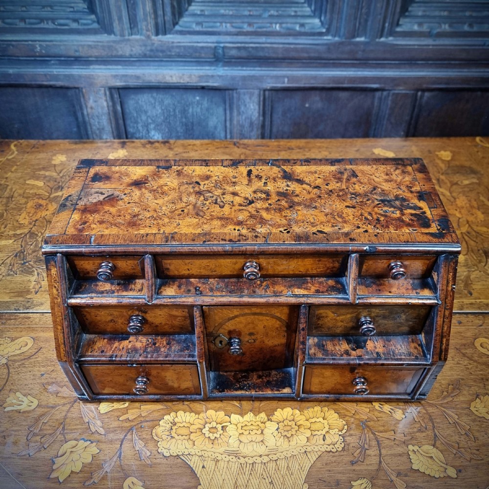 An early 18th century burr walnut jewelery chest. View XI